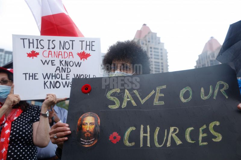 Ontario, Canada: Protesters react to the recent burnings and vandalizing of Churches. The protesters gathered this weekend  at Square One, in Mississauga. Photo: Gustavo Kralj/Gaudiumpress Images