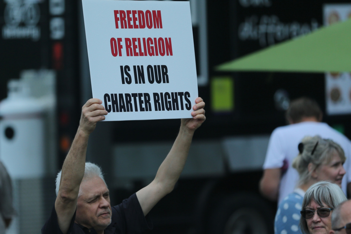 Ontario, Canada: Protesters react to the recent burnings and vandalizing of Churches. The protesters gathered this weekend  at Square One, in Mississauga. Photo: Gustavo Kralj/Gaudiumpress Images